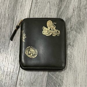 Comme des Garcons Black Wallet with Gold Crest Emblem Print